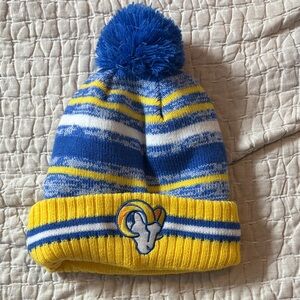 New Era Blue and Yellow Striped Beanie with Pom-Pom